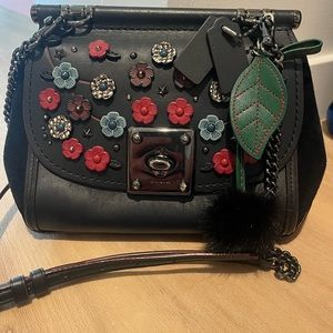 Coach leather and suede shoulder bag with flowers and fur decorations